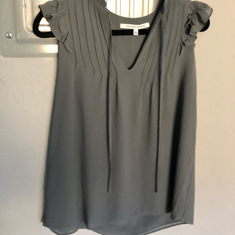 Collective concepts gray sleeveless top.